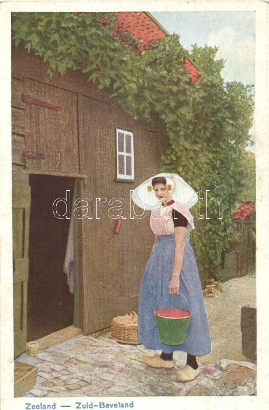 Zeeland, Zuid-Beveland; Lady in traditional dress with bucket, Dutch folklore (cut), Holland folklór (vágott)