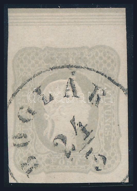 Grey newspaper stamp with large upper margin 