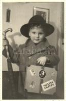 German child with Pikkolo Koffer, humour photo