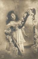 Little girl with a harp