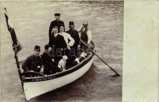 Cirkvenica boat, couple with soldiers and priest, dogs photo