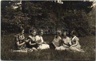 Girls playing cards photo