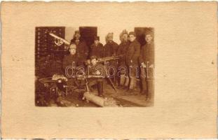 WWI artillery soldiers with various weapons photo