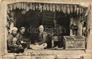 Albanian folklore from Shkoder (Skutari), Albanian shoe maker in their workshop (EK)