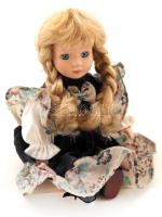 Porcelánfejű baba színes ruhában, m: 15,5 cm