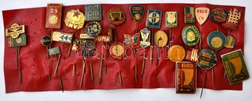 35db vegyes külföldi céges kitűző a szocialista időszakból műbőr lapra tűzve T:2,2- 35pcs of mixed company pins from the socialist era T:XF,VF