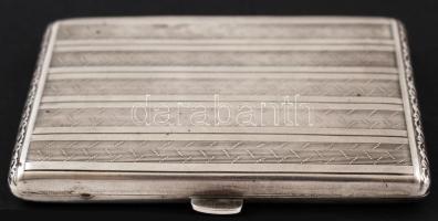 Ezüst(Ag) cigarettatárca oldalán indamotívumokkal díszítve, jelzett, 63,2 g /
silver (Ag) cigarette ...