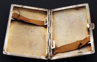 Ezüst(Ag) cigarettatárca oldalán indamotívumokkal díszítve, jelzett, 63,2 g /
silver (Ag) cigarette ...