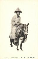 Riding on Ass. Peasant man, Vietnam, folklore