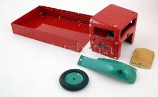 Összerakható Märklin teherautó darabokban, számos alkatrésszel