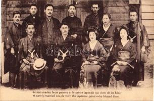 Newly married couple with the Japanese priest who blessed them, Japanese folklore