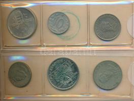 44db vegyes magyar és külföldi fémpénz és zseton kis albumban, közte érdekesebb darabok is! T:vegyes...