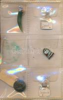 Érdekes kitűzők, gombok, medálok, gyöngyök berakóban, 15 db