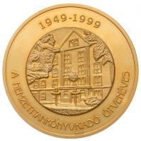 1999. "50 éves A Nemzeti Tankönyvkiadó" aranyozott Br emlékérem, dísztokban (60mm) T:2 (PP...