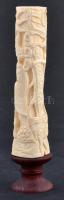 Keleti motívumos, díszesen faragott csont szobor, fa talapzaton, jelzés nélkül, m: 17 cm