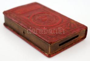 Könyvalakú, vászonkötésű, német gyártmányú (John J. Moser Berlin), gazdagon díszített fém persely &q...