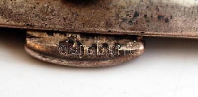 Ezüst (Ag.) cigarettatárca, jelzett, zománc díszítéssel, néhol kipattant, 7,5×8,5 cm, nettó:120 g