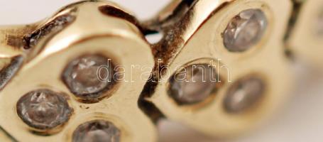 Arany (Au) 14 K gyűrű szintetikus kövekkel díszítve, jelzett, méret: 58, br: 3,1 g