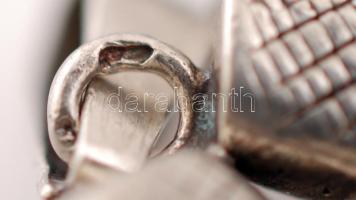 Agyarak ezüst foglalatban, Ag., bruttó 8,8gr., 4,5cm