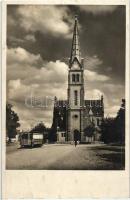 Debrecen, Kossuth utcai református templom, villamos; a Springer papírkereskedés kiadása