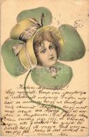 Lady, clover s: E.M. Kantner (EK)