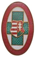 ~1945-1947. Nővér jelvény, zöld kereszt fehér mezőben, piros szélekkel, Kossuth-címer. Zománcozott fém jelvény (33x21mm) T:2 Hungary ~1945-1947. Nursing badge, green cross in oval white field with red border, in the middle Hungarian coat of arms. Enamelled metal badge (33x21mm) C:XF HV 883.