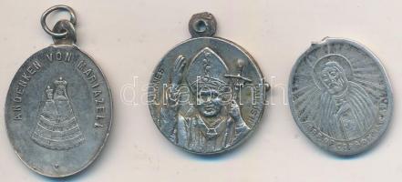 3db vallási medál, kettő Ag, közte "Mariazelli emlék" Ag medál (25x17mm) T:2,3
3pcs of mi...