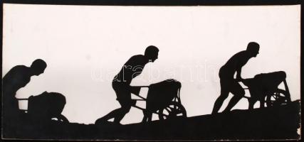cca 1980 Gyarmati Lajos: Munka, feliratozott vintage fotóművészeti alkotás, kasírozva, egyik szélén sérülésekkel, 18x40 cm