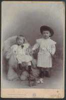 cca 1900 Gyerekek játékokkal, keményhátú fotó Angerer műterméből, Bécs, 16x11 cm / cca 1900 Kids, Angerer photo, Vienna, 16x11 cm
