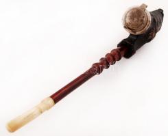 Emberfejet ábrázoló kerámia pipa, fából készült szárral, h: 56 cm + vadkanfejet mintázó kerámia pipa...