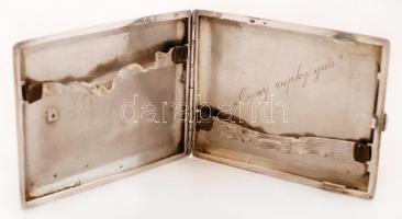 Ezüst (Ag.) cigarettatárca, jelzett, mesterjeggyel, apró horpadással, belül gravírozott felirattal, ...