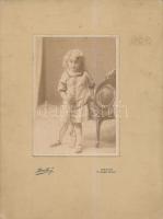 1912 "Pannika", kislány teniszütővel, Némethi J. műterméből, Debrecen, M-Sziget Ungvár, kartonra kasírozott fotó, 15x11 cm, karton 28x21 cm