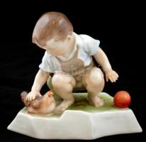 Zsolnay tyúkot simogató kisfiú labdával, kézzel festett, jelzett (Sinkó András), apró kopásnyomokkal, m:15 cm