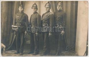 cca 1920 Szekszárd, Négy fiatal tűzoltó Borgula fényképész műtermében, hidegpecséttel jelzett fotólap, 9x14 cm