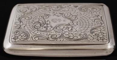 Koronás, cizellált ezüst (Ag.) dohánytárca, EG monogrammal, jelzett, 83g., 9x7x1cm/Chiselled silver (Ag.) tobacco wallet, initials EG, marked, 83g. 9x7x1cm