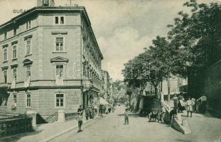 Susak, street, Singer sewing machine advertisment written on the left building (kopott sarkak / worn edges)