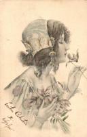 Lady with flower, M.M. Vienne, s: F.T.