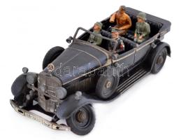 cca 1930-40 Mercedes 770K luxusautó modell, amelyet elsősorban díszszemléken használt a náci vezér, Hitler. A kulccsal felhúzható modell 4 kivehető figurát tartalmaz, Hitlert, 1 SS tisztet és 2 katonát. Közepes állapotú, a figurák apró, részben javított hibákkal. Nem kipróbált állapotban. cca 24x8cm/ cca 1930-40 770K Mercedes luxury car model, which is primarily used for parades of the Nazi leader, Hitler. The keyless models include 4 removable figure, Hitler, the SS officer 1 and 2 soldiers. Average state, the tiny figures, partly corrected errors. cca 24x8cm