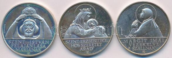 Fülöp Zoltán (1951-) 1994. "Magyar Szentek II. - Szent Erzsébet, Nagyboldogasszony, Szent Margit" 3xklf db-ból álló Ag emlékérem szett eredeti dísztokban sorszámozott tanúsítvánnyal (32,4g/0.925/40mm) T:PP kis ujjlenyomat, felületi karc