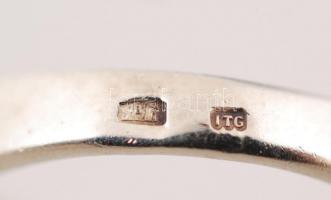 Ezüst(Ag) gyűrű cirkónia kövekkel, jelzett, méret: 57, br: 3,3 g