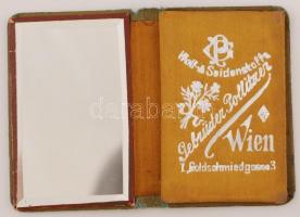 cca 1900-1930 "Wien" feliratú kisméretű jegyzetfüzet, benne tükörrel, kopott, díszes vászo...
