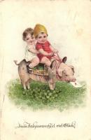 Zum Jahreswechsel viel Glück! / New Year, children riding pig on a field of clovers, litho (EB)