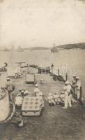 Osztrák-Magyar haditengerészek lőgyakorlat közben / K.u.K. Sailors gunnery drill aboard a warship, published by Stephan Vlach in Pola