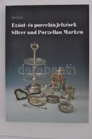 Kiss László: Ezüst- és porcelánjelzések. Silver und Porzellan Marken. Pozsony, 2004. Magyar-német nyelven, papírkötésben, új állapotban.