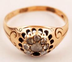 Arany 14K (Au) fejes gyűrű, gyémántokkal (7db), egyik hiányzik, jelzett, méret:61, bruttó:4,2 g