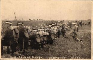 Japanes soldiers forming up in rank, probably Russo-Japanese War of 1904-1905, implied by the uniforms (EK)