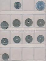 53db-os vegyes külföldi fémpénz tétel piros "MÜNZEN" feliratú érmetartó albumban, főleg né...