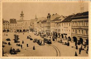 Ceské Budejovice, Námestí / square, tram, pharmacy, market, shop of M.W. Trojan, Singer and Eduard Blana