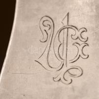 Ezüst (Ag.) merőkanál, jelzett, mesterjeggyel (K.M.) apró horpadással, h:28 cm, nettó:164 g