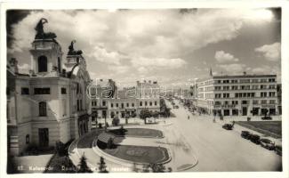 Kolozsvár, Cluj; Deák Ferenc út, gyógyszertár, Perry autószalon, Dombi és St. Penes üzlete / street, pharmacy, shops